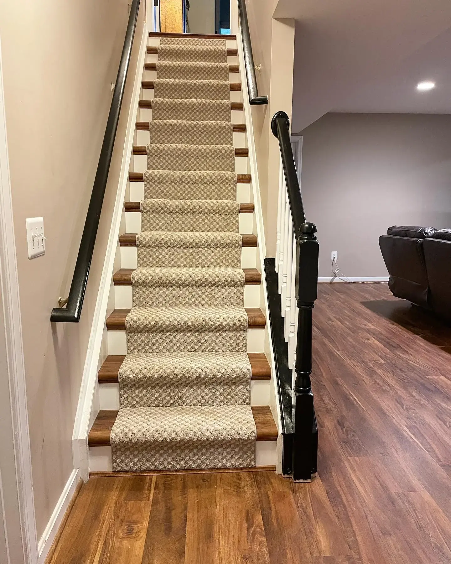 Finished Tuftex runner above Mannington luxury vinyl flooring