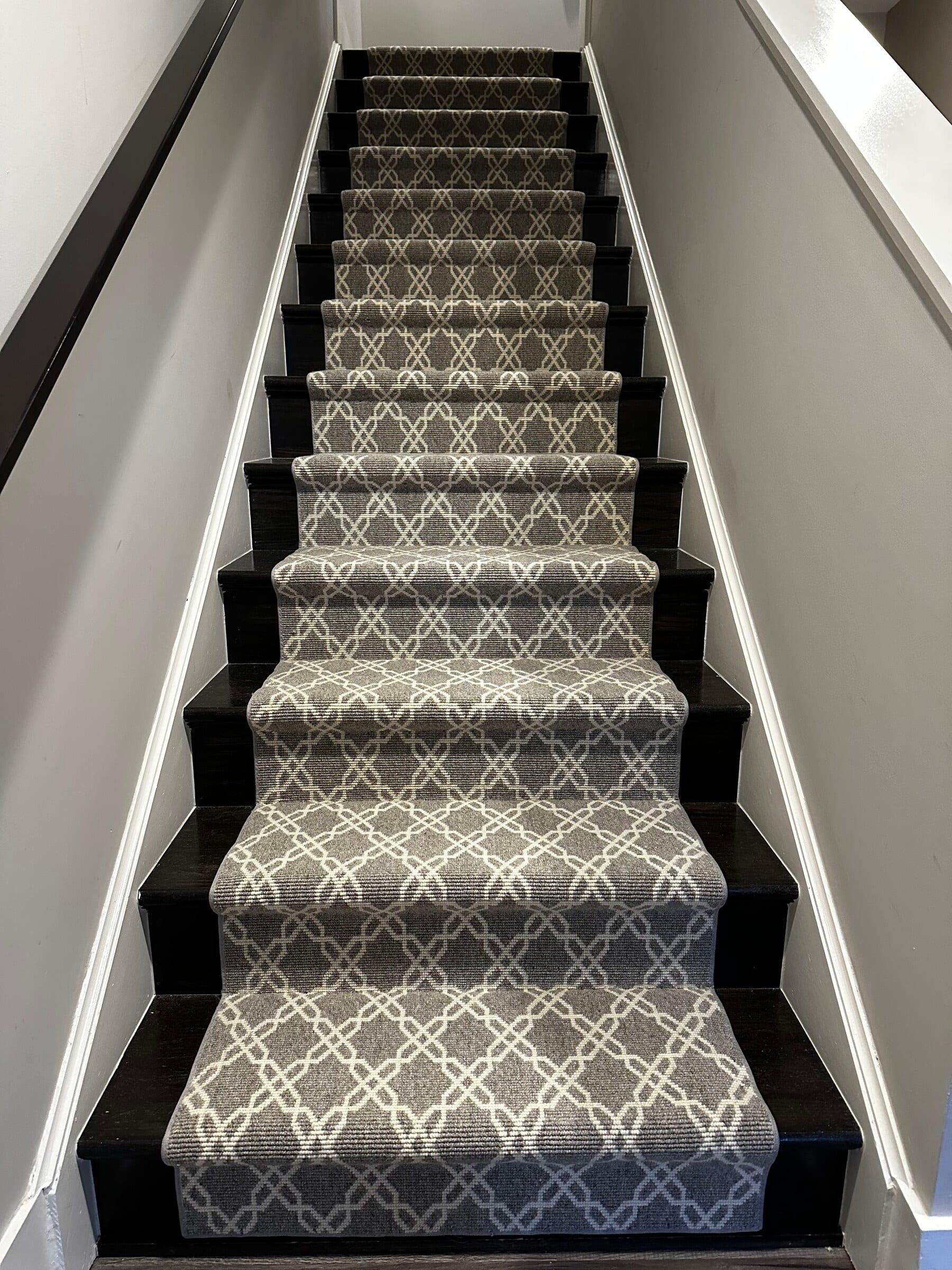 A patterned wool stair runner installed by Carpet & Vacuum Expo in a Montgomery County home.