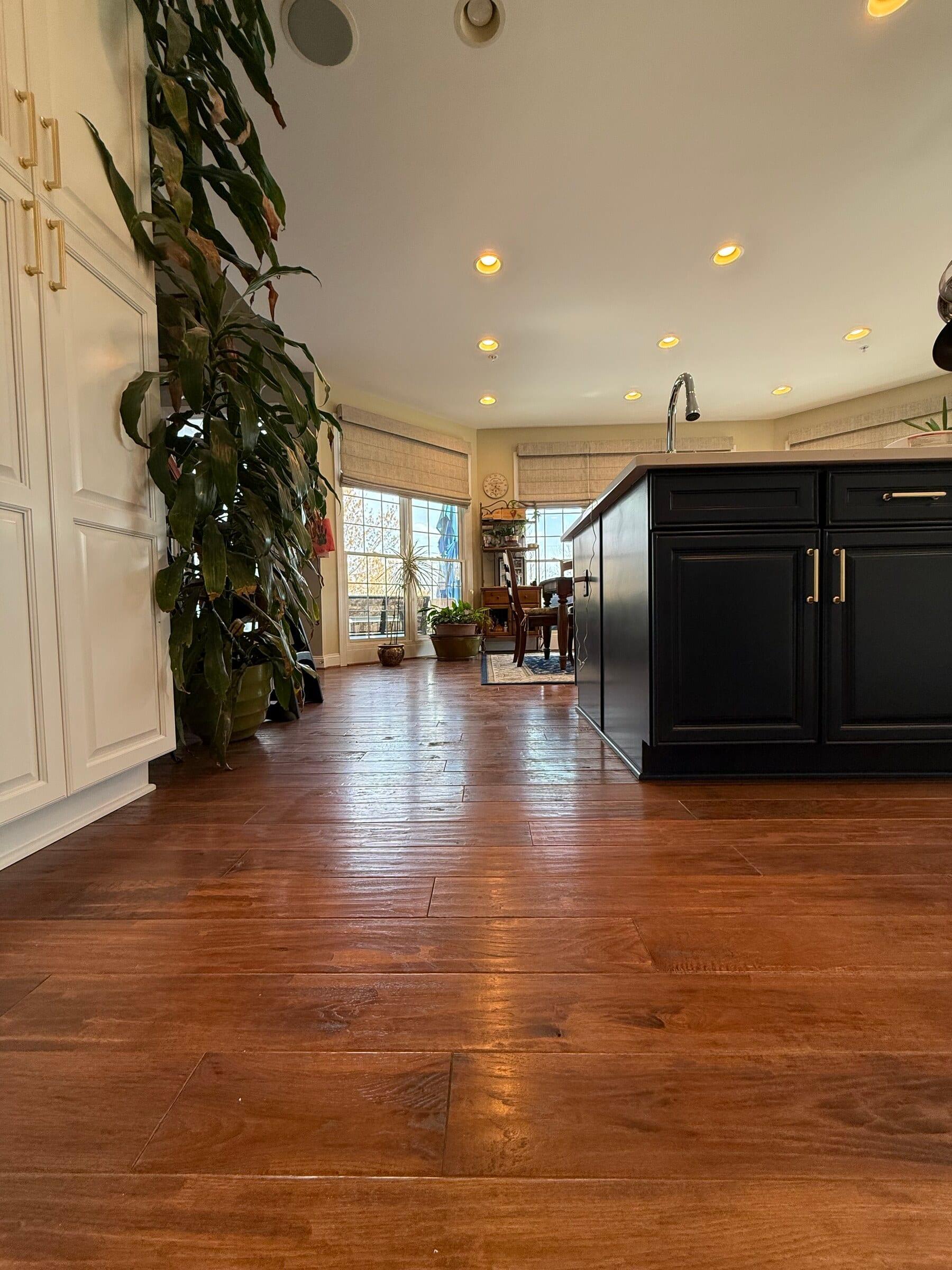 Another view of the flooring beside the kitchen island