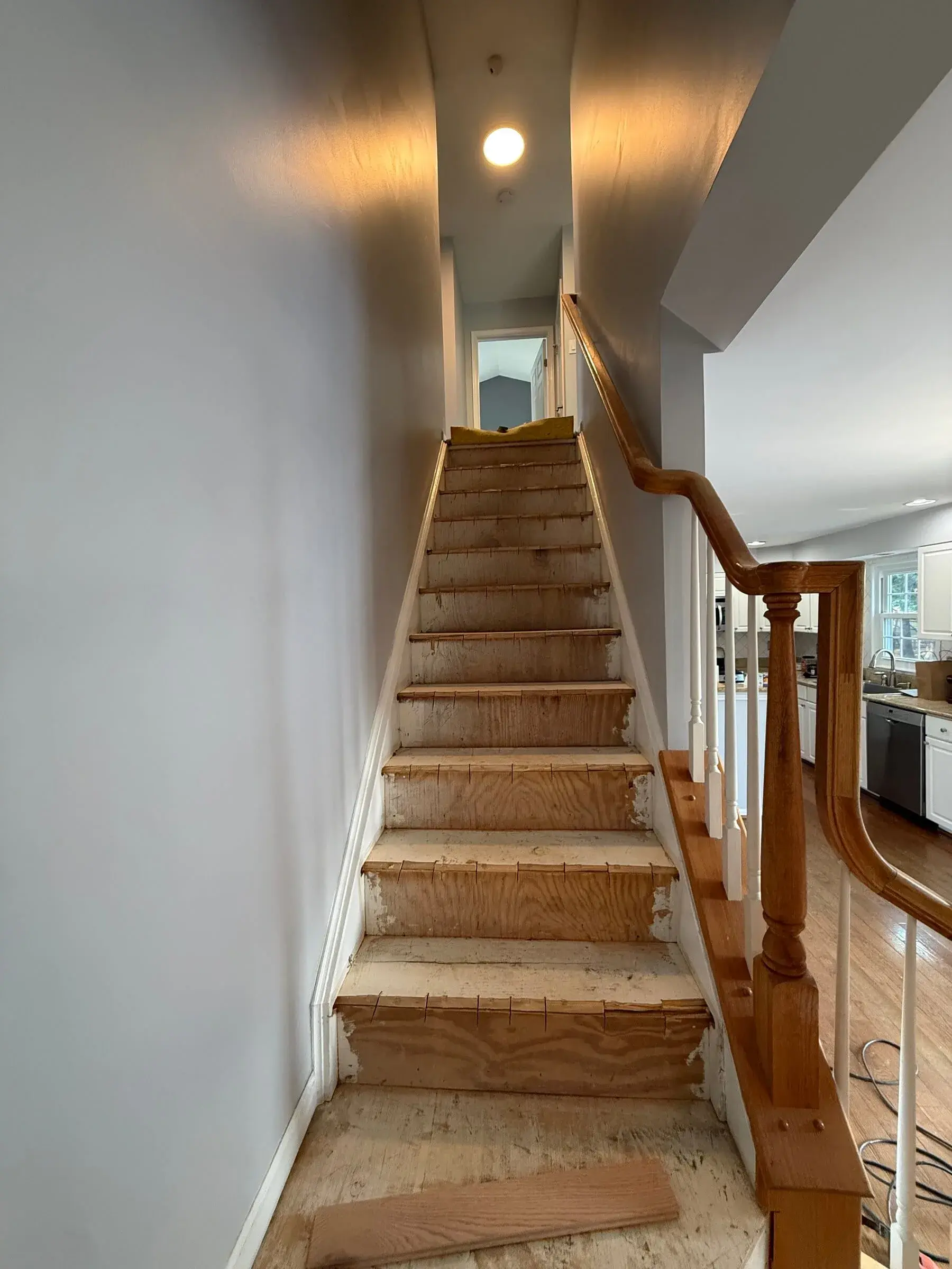 Before refinishing, Hardwood stair install