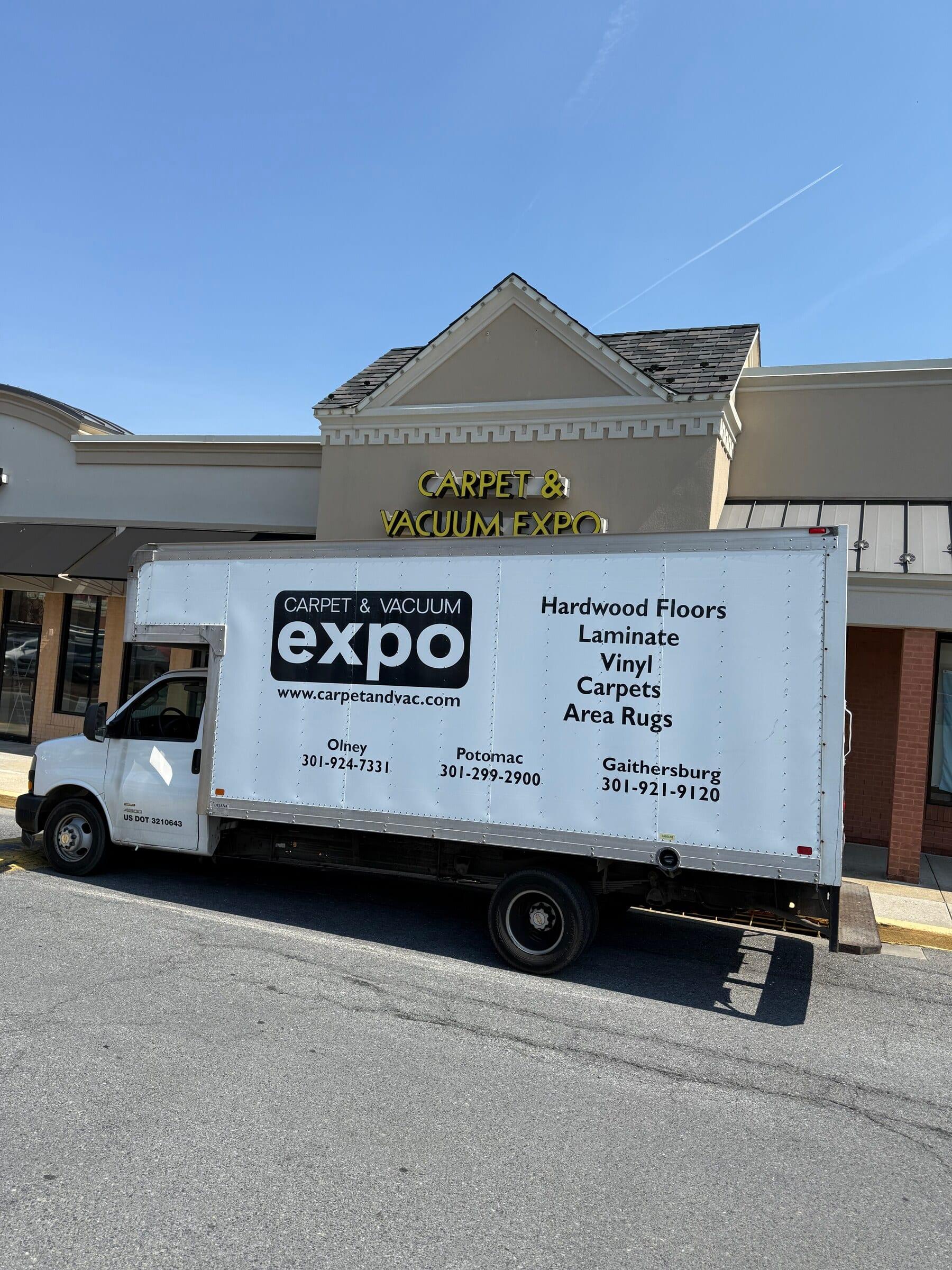 A Carpet & Vacuum Expo installation truck.