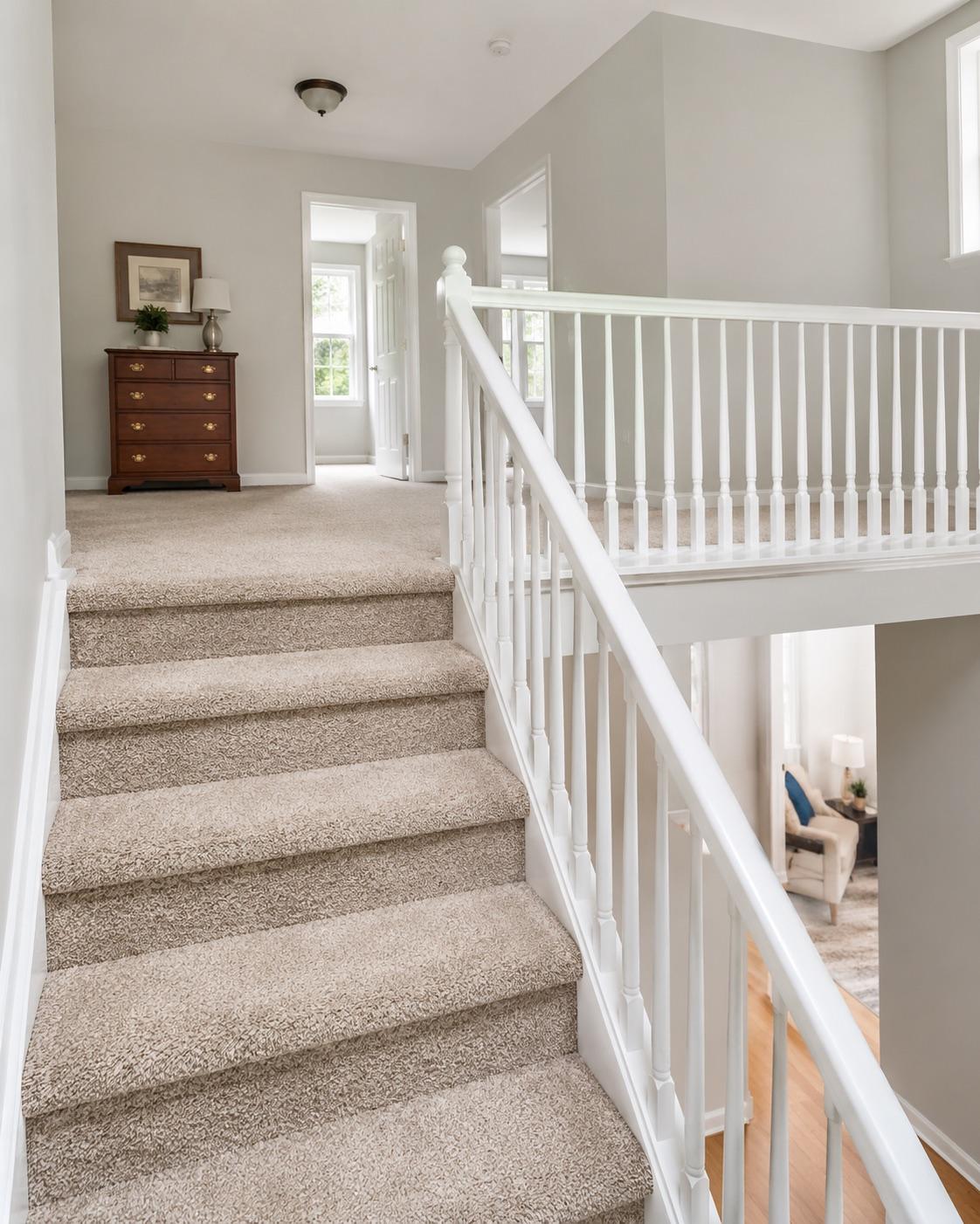 New plush carpet on a staircase and landing in an Aspen Hill colonial.